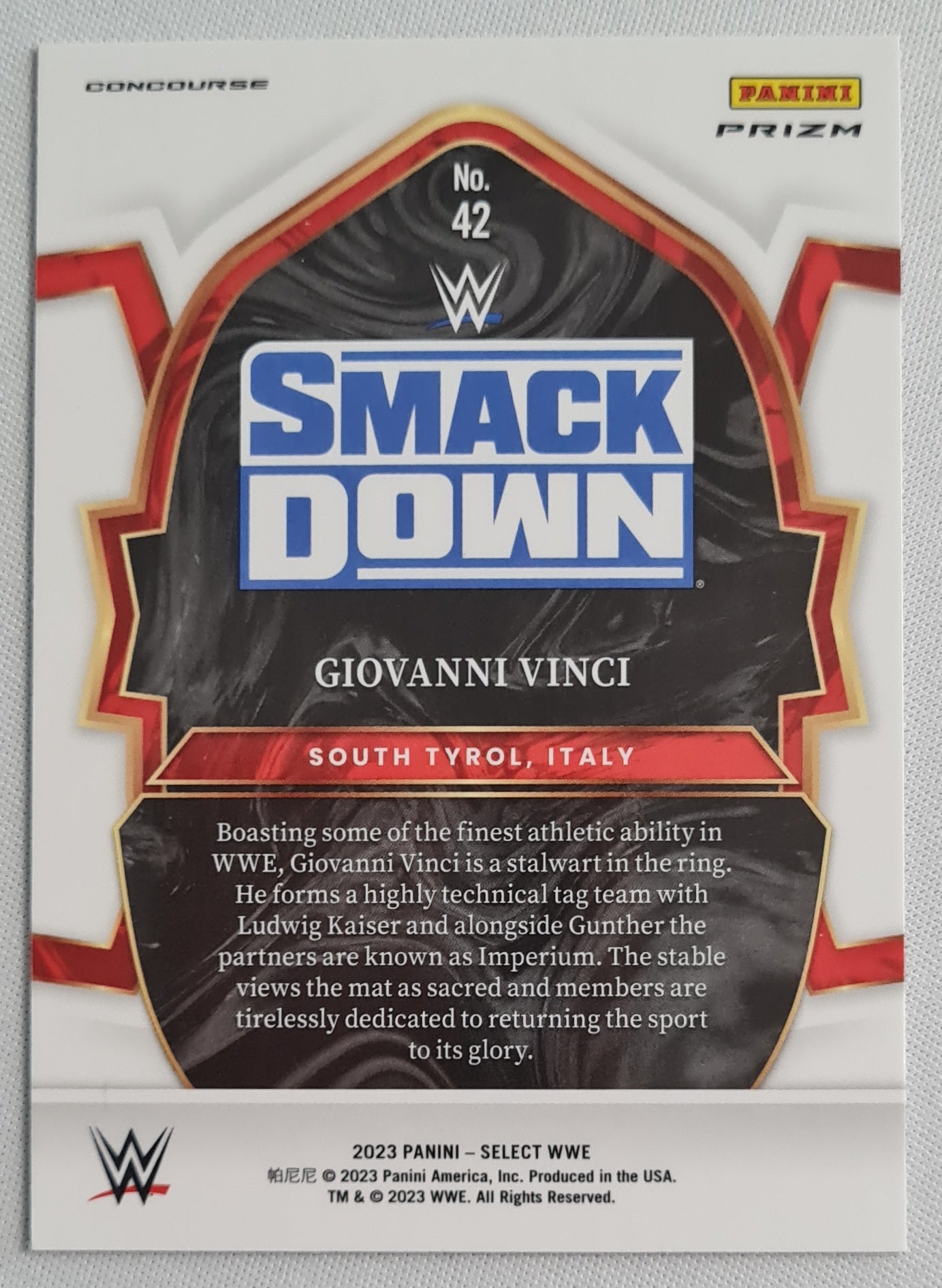 Giovanni Vinci - 2023 Panini Select WWE #42 SMACK DOWN Orange Sensations Prizm
