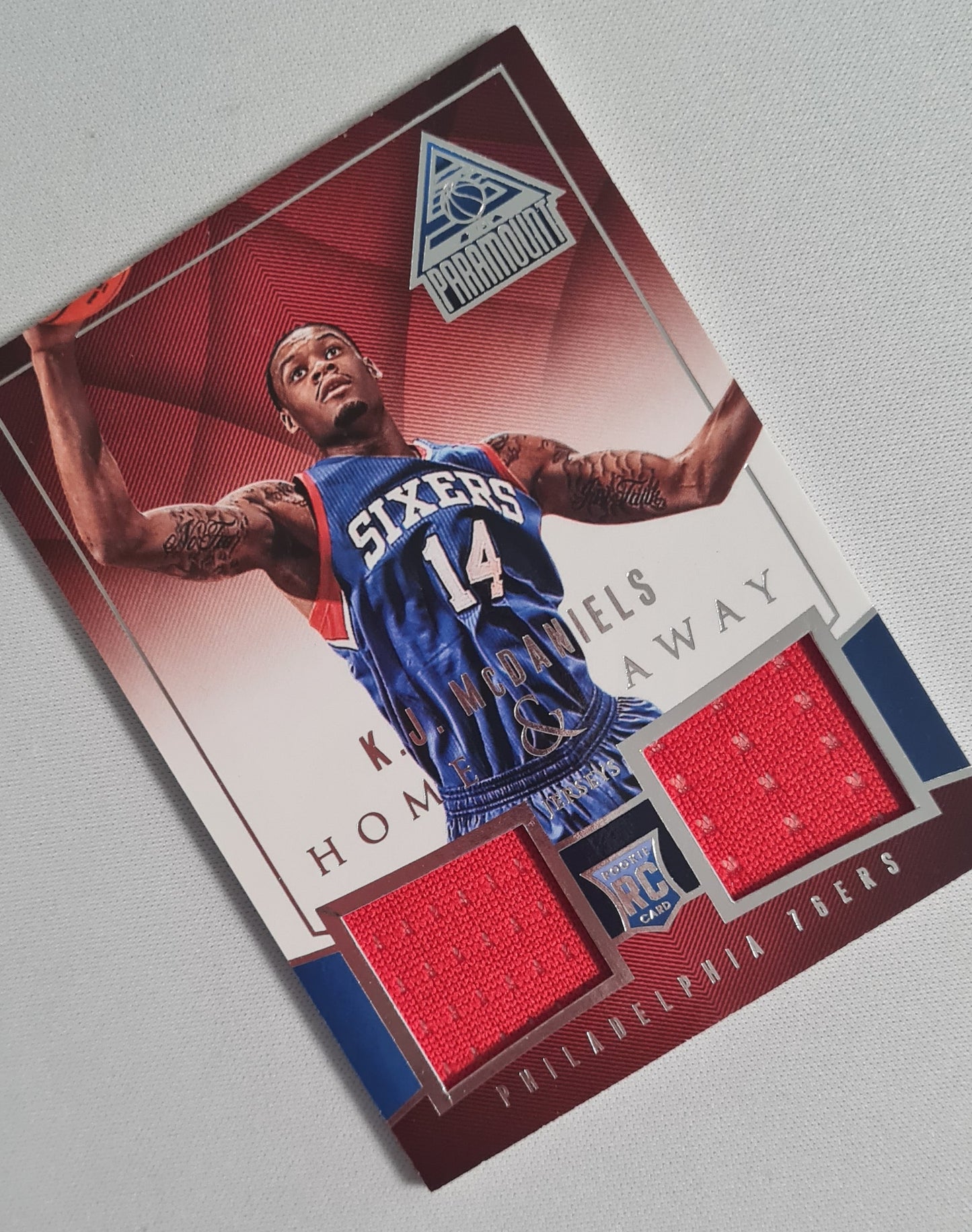 K.J. McDaniels - 2014 Panini Paramount Home & Away Jerseys 76ers #10 (RC) Patch /40