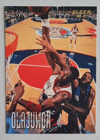 Hakeem Olajuwon - 1996/97 Fleer/Skybox NBA Basketball Houston Rockets  #42