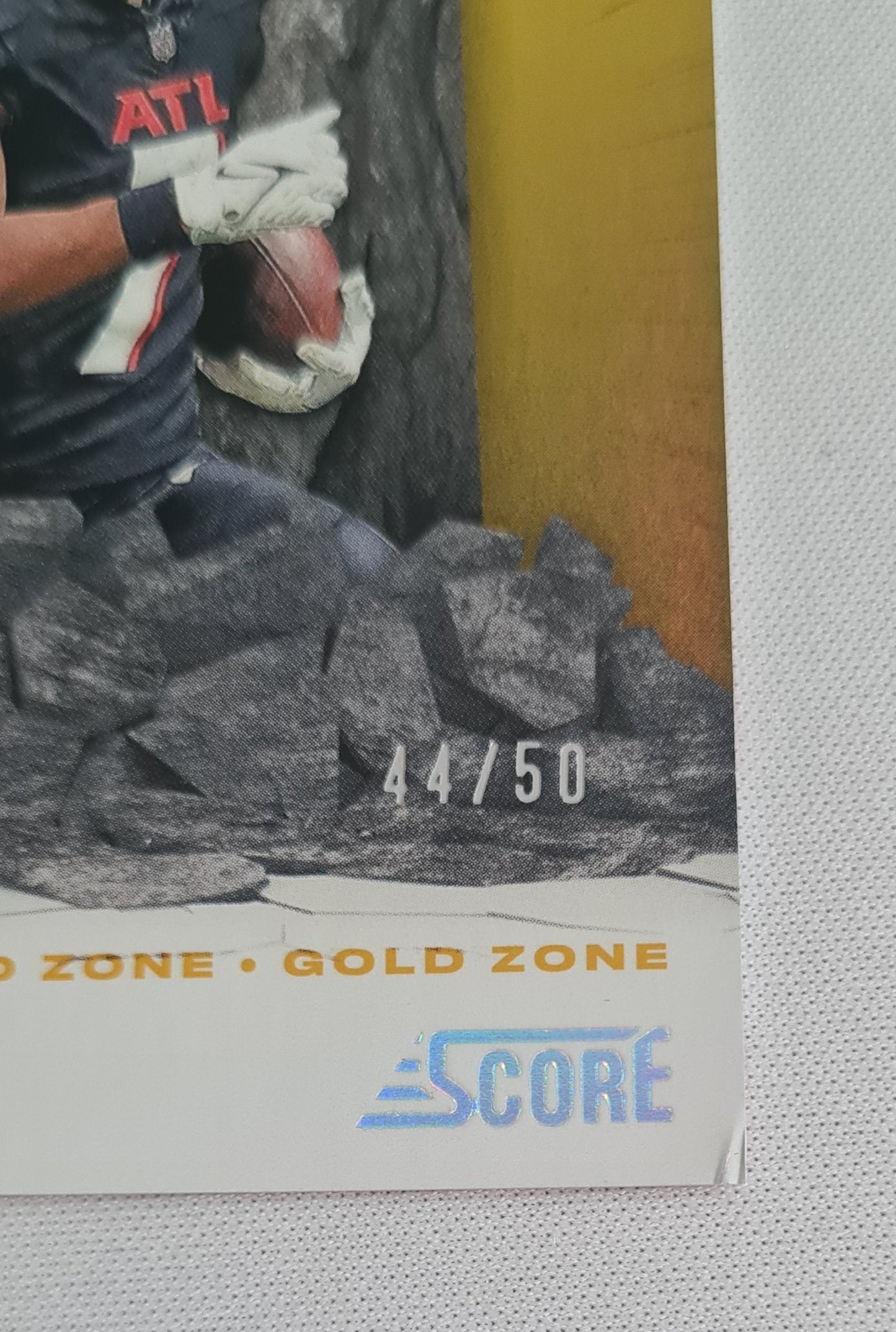 Bijan Robinson - 2024 Panini Score Football NFL Atlanta Falcons Emerged Gold Zone #EM-BRN /50 (damaged corner)