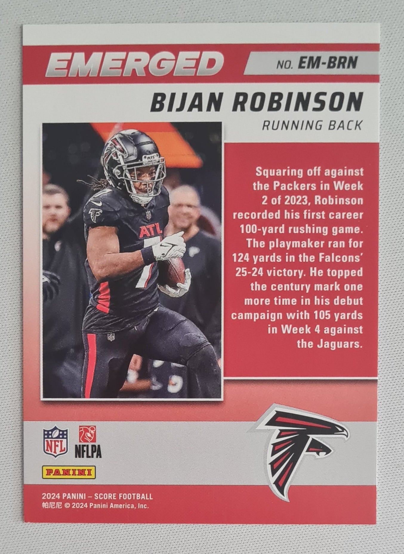 Bijan Robinson - 2024 Panini Score Football NFL Atlanta Falcons Emerged Gold Zone #EM-BRN /50 (damaged corner)