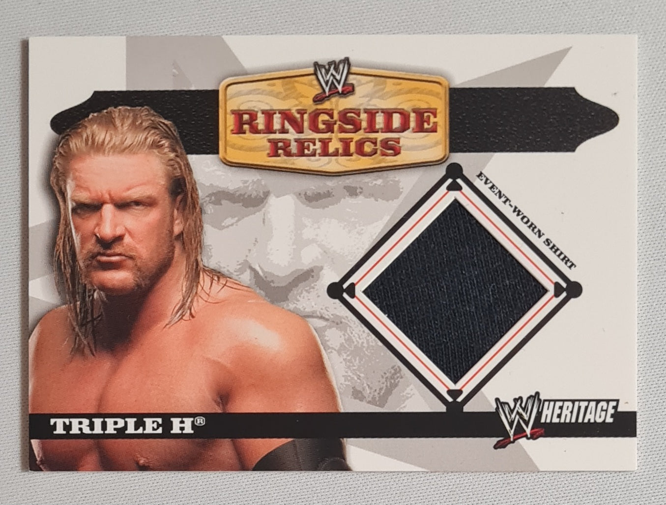 Triple H - 2006 Topps Heritage Ringside Relics