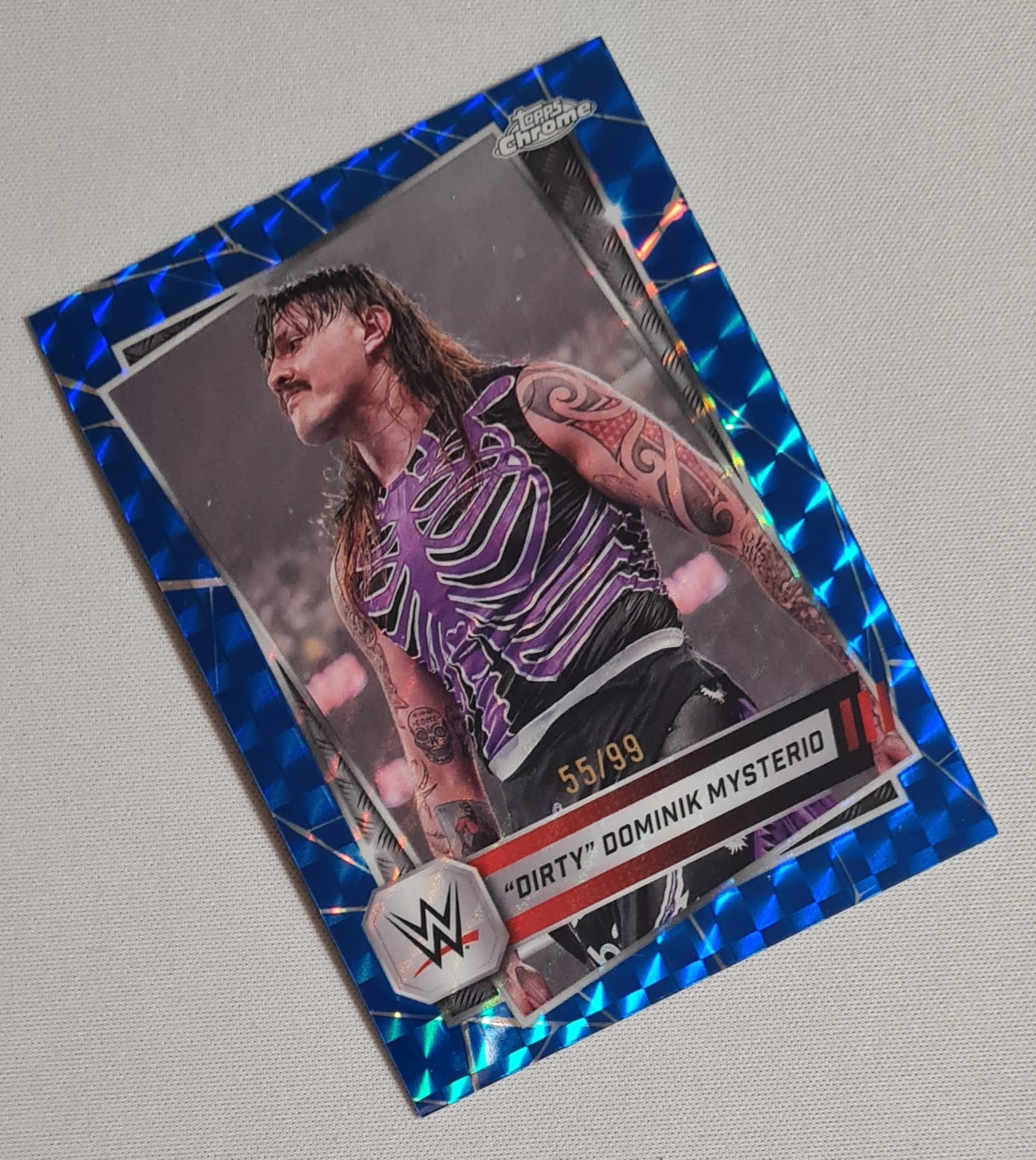 "Dirty" Dominik Mysterio - 2025 Topps Chrome WWE Wrestling RAW #35 Blue Geomatric Refractor /99