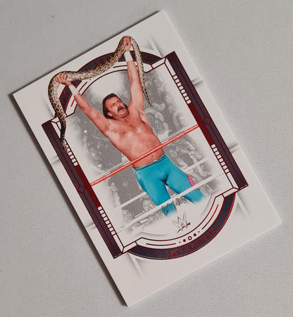 Jake Roberts - 2024 Panini National Treasures WWE Wrestling #90 Red Foil Parallel /75