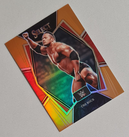 The Rock - 2022 Panini Select WWE Wrestling Legends #162 Premier Level Orange Prizm /35