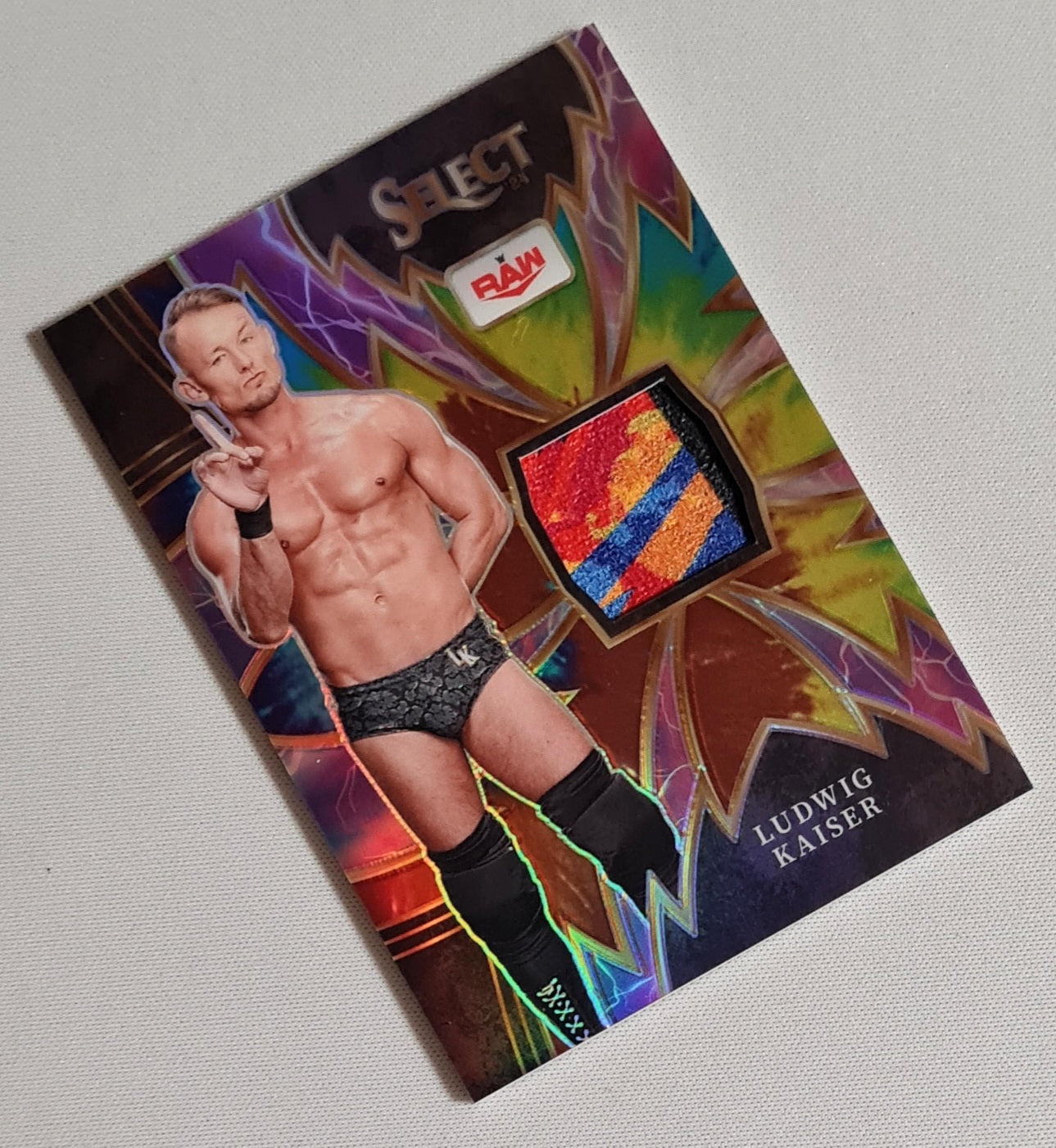 Ludwig Kaiser - 2024 Panini Select WWE Wrestling RAW Sparks #SP-LKS /Patch /25