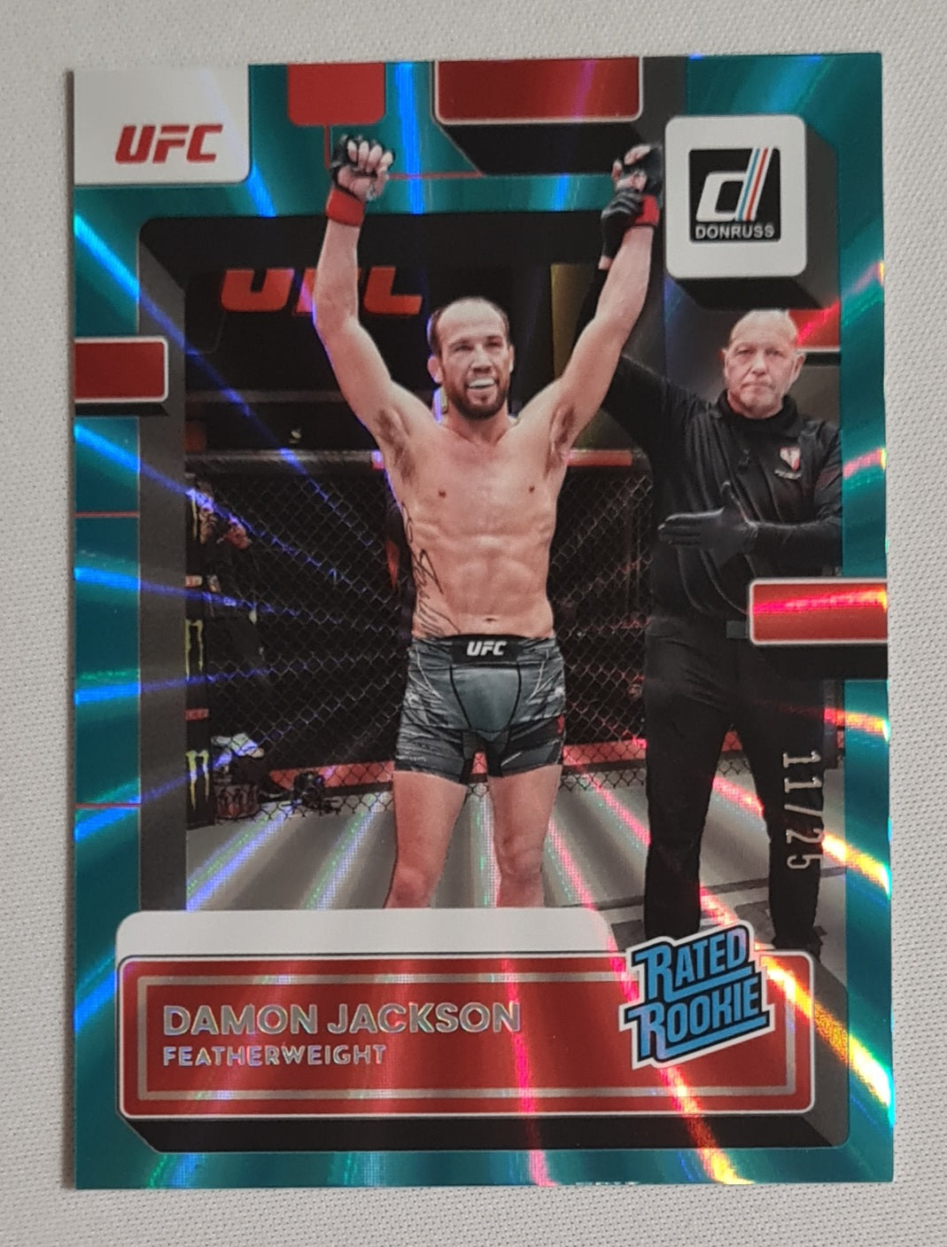 Damon Jackson - 2023 Panini Donruss UFC Fighter Featherweight Rated Rookie #215 Aqua Laser /25