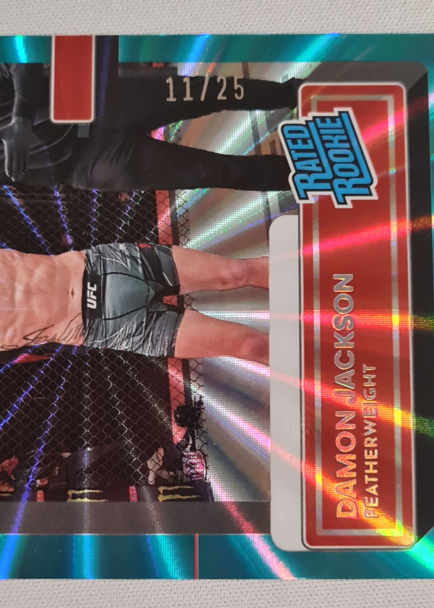 Damon Jackson - 2023 Panini Donruss UFC Fighter Featherweight Rated Rookie #215 Aqua Laser /25