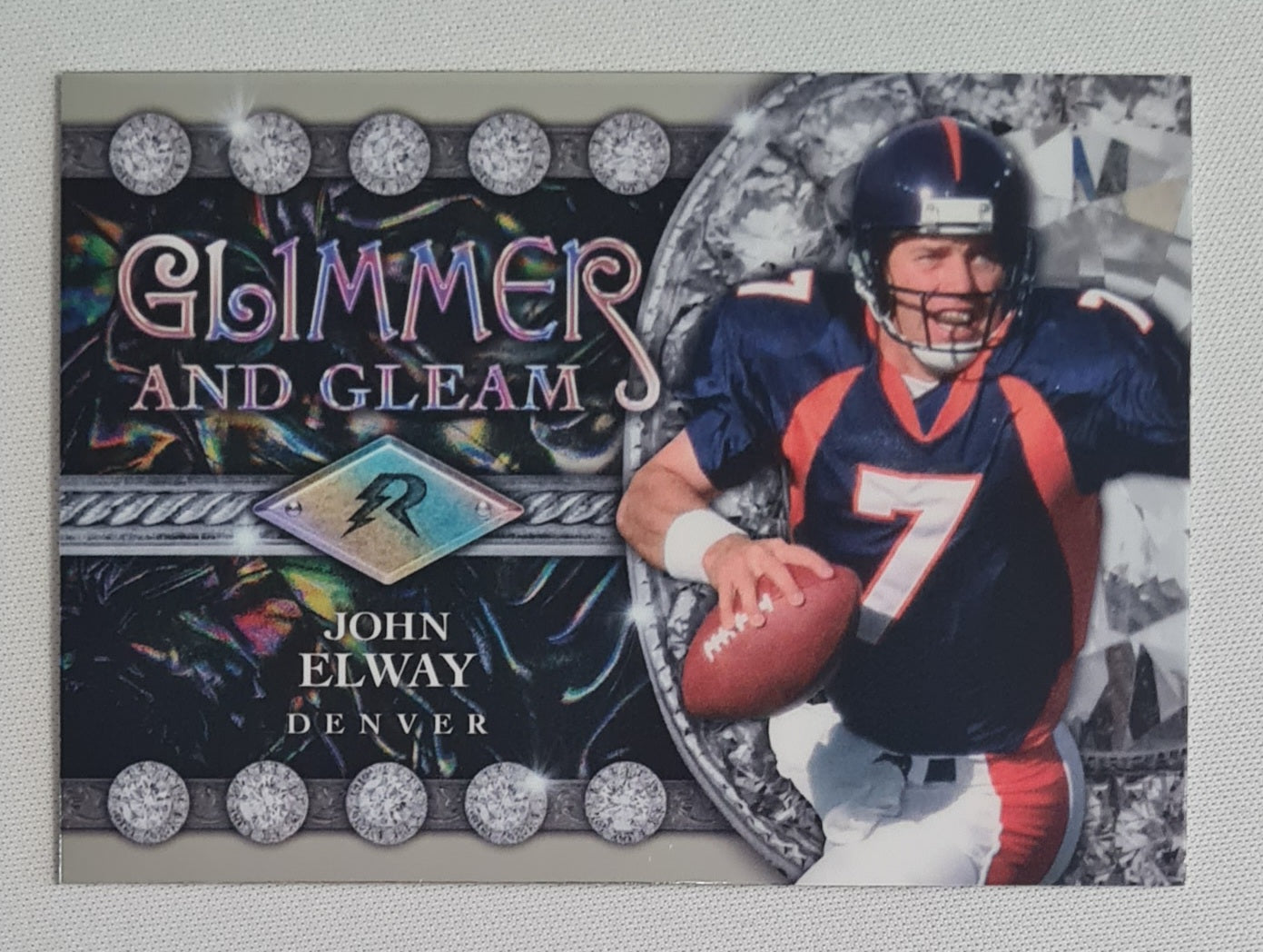 John Elway - 2025 Topps  Football NFL Denver Broncos - Glimmer and Cleam - #GG-3