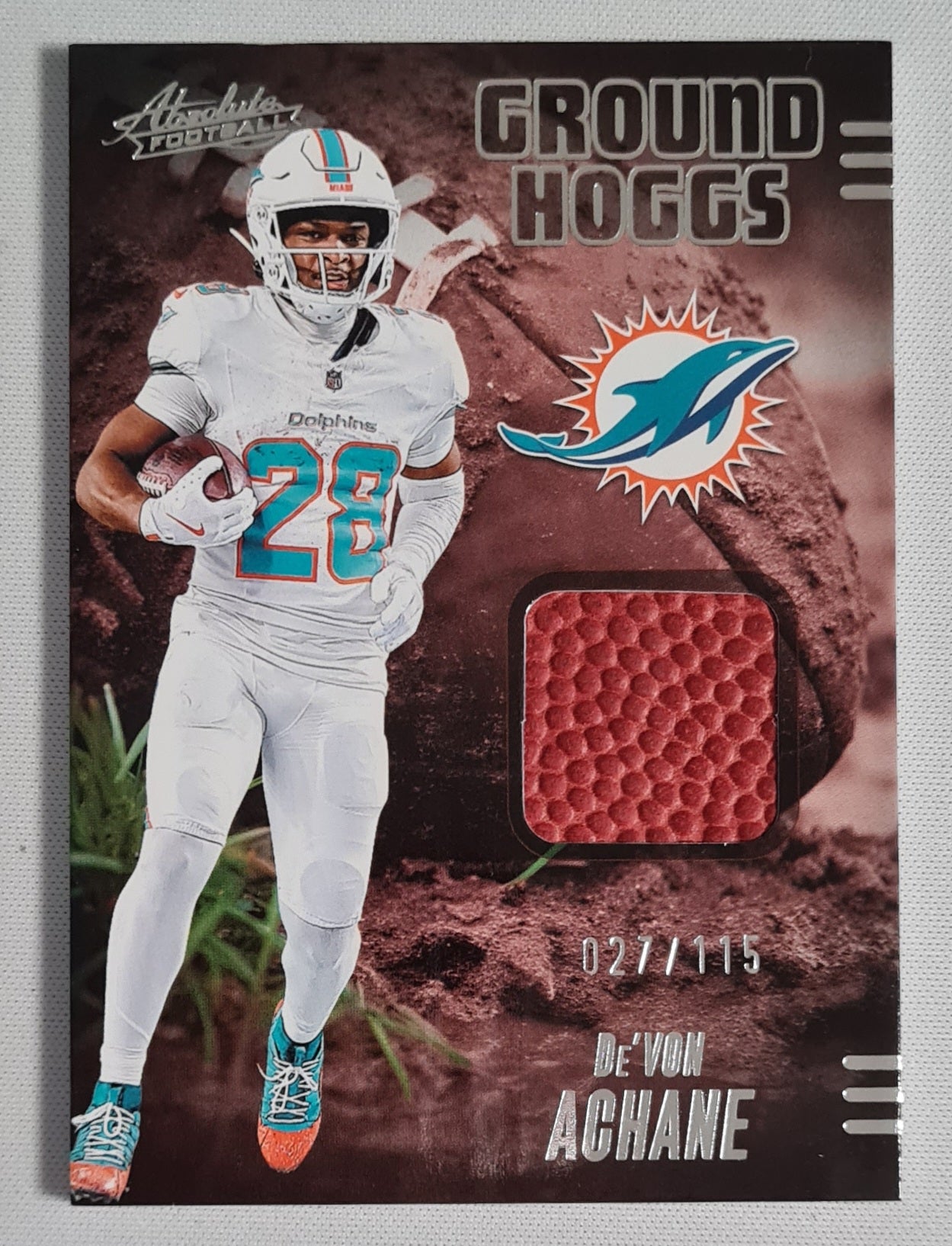 De'Von Achane - 2025 Panini Absolute Football NFL GROUND HOGGS Miami Dolphins #GHM-DAC /115 /Relic Memorabilia