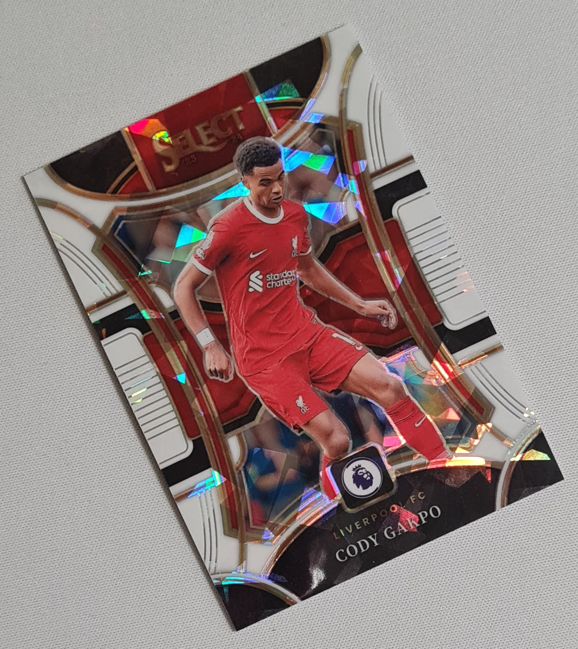 Cody Gakpo - 2023/24 Panini Select Premier League Soccer #153 Mezzanine Prizm White Cracked Ice /85