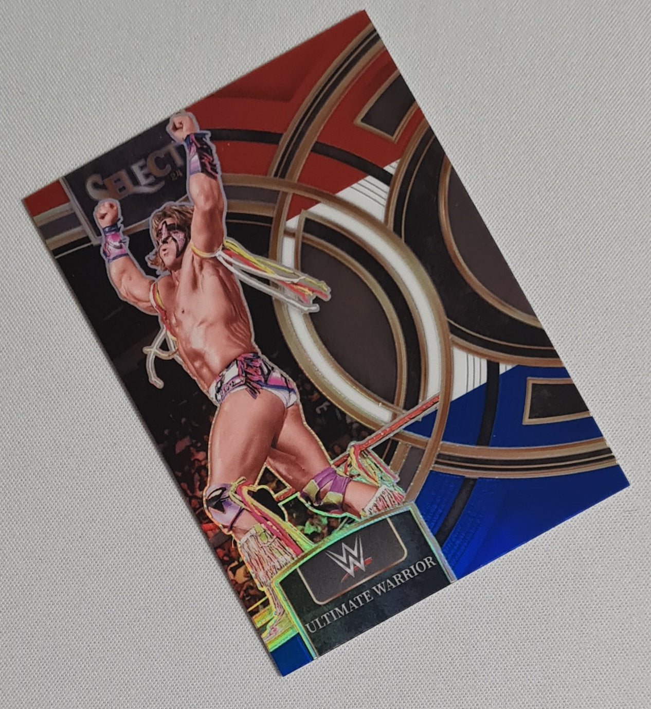 Ultimate Warrior - 2024 Panini Select WWE Wrestling Legends #148 Red/White/Blue Prizm