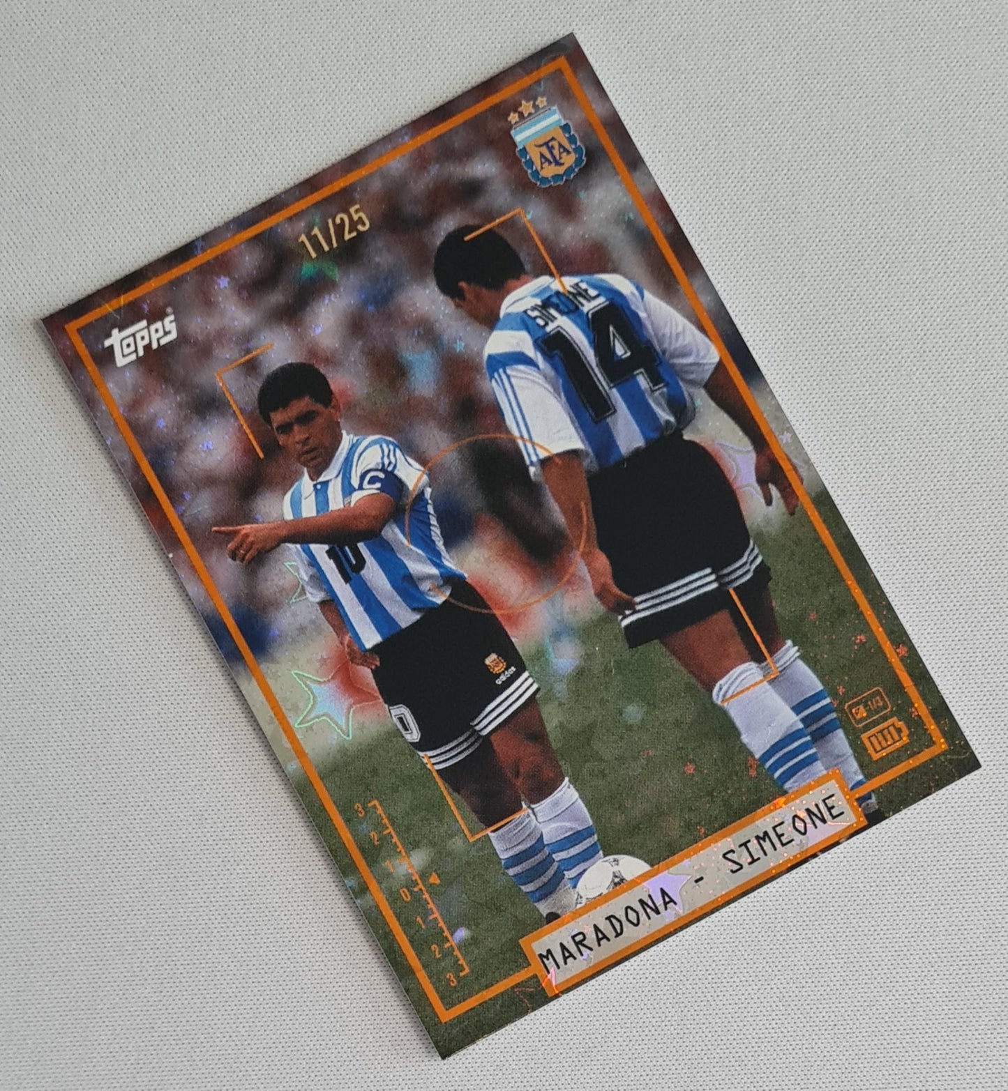 Diego Maradona & Diego Simeone - 2025 Topps Focus Argentina Full Bleed Orange AFA Starballer /25 #35
