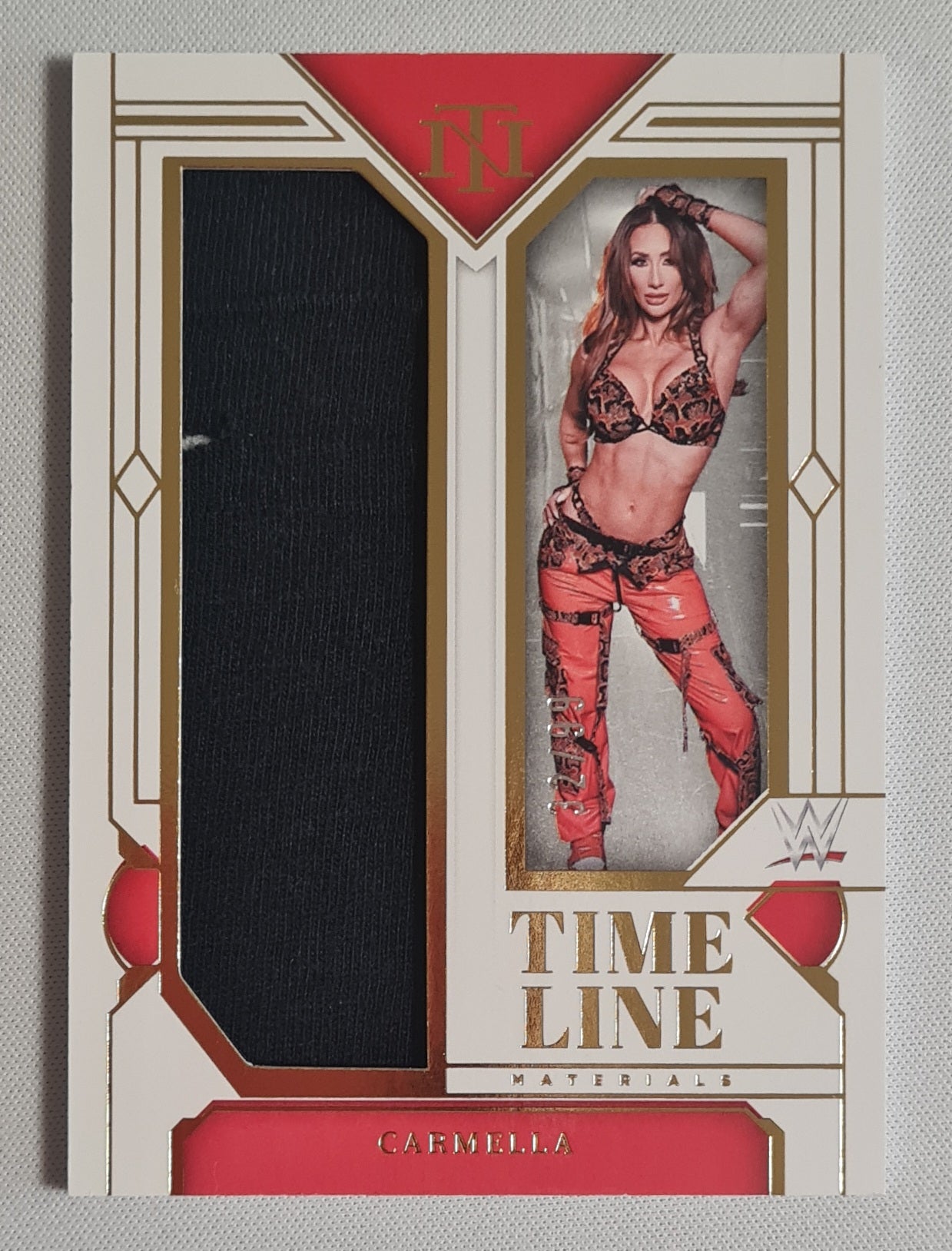 Carmella - 2024 Panini National Treasures WWE Timeline Materials /99 #TM-CML