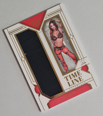 Carmella - 2024 Panini National Treasures WWE Timeline Materials /99 #TM-CML