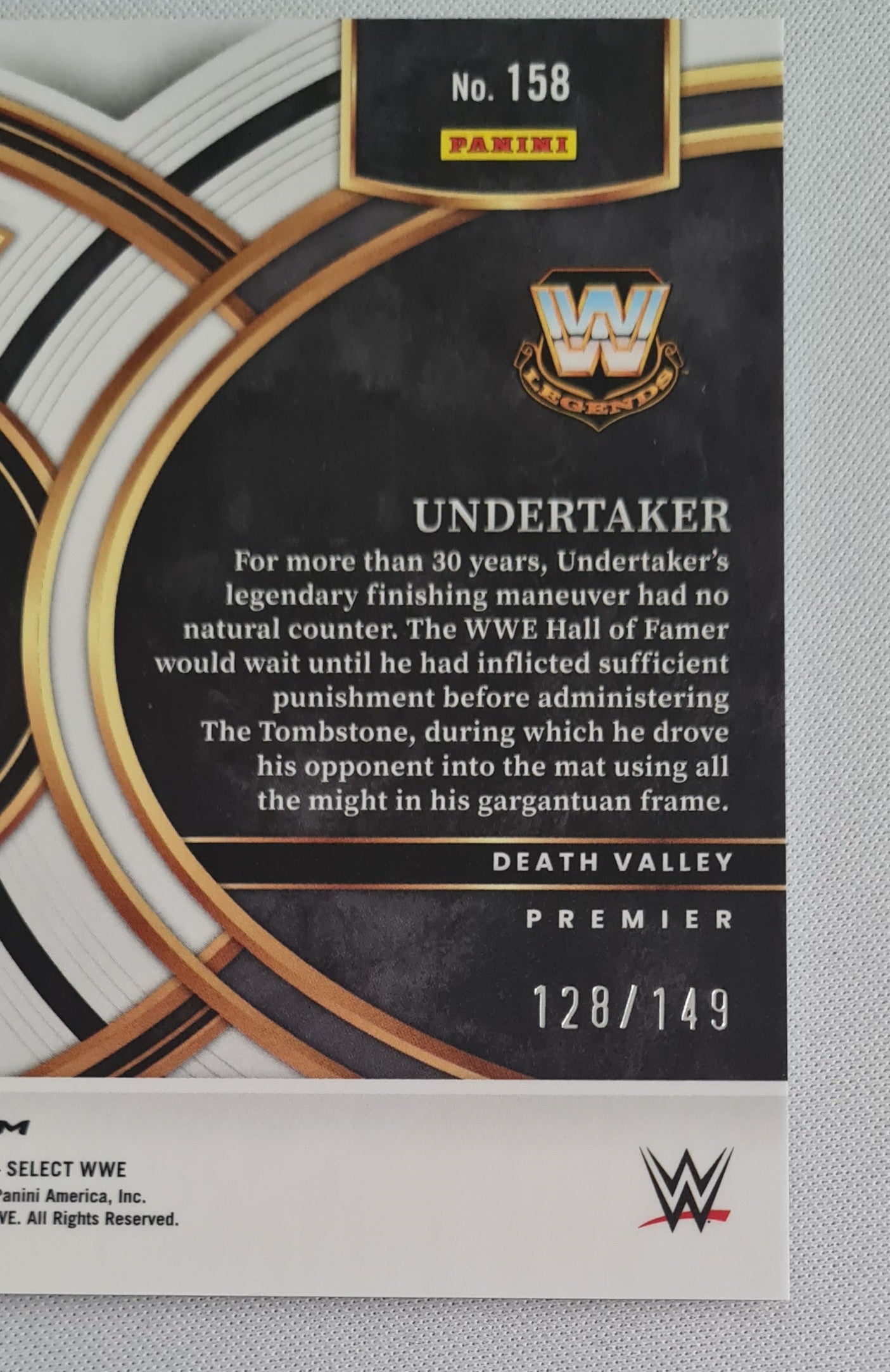 Undertaker - 2024 Panini Select WWE Premier Maroon /149 #158