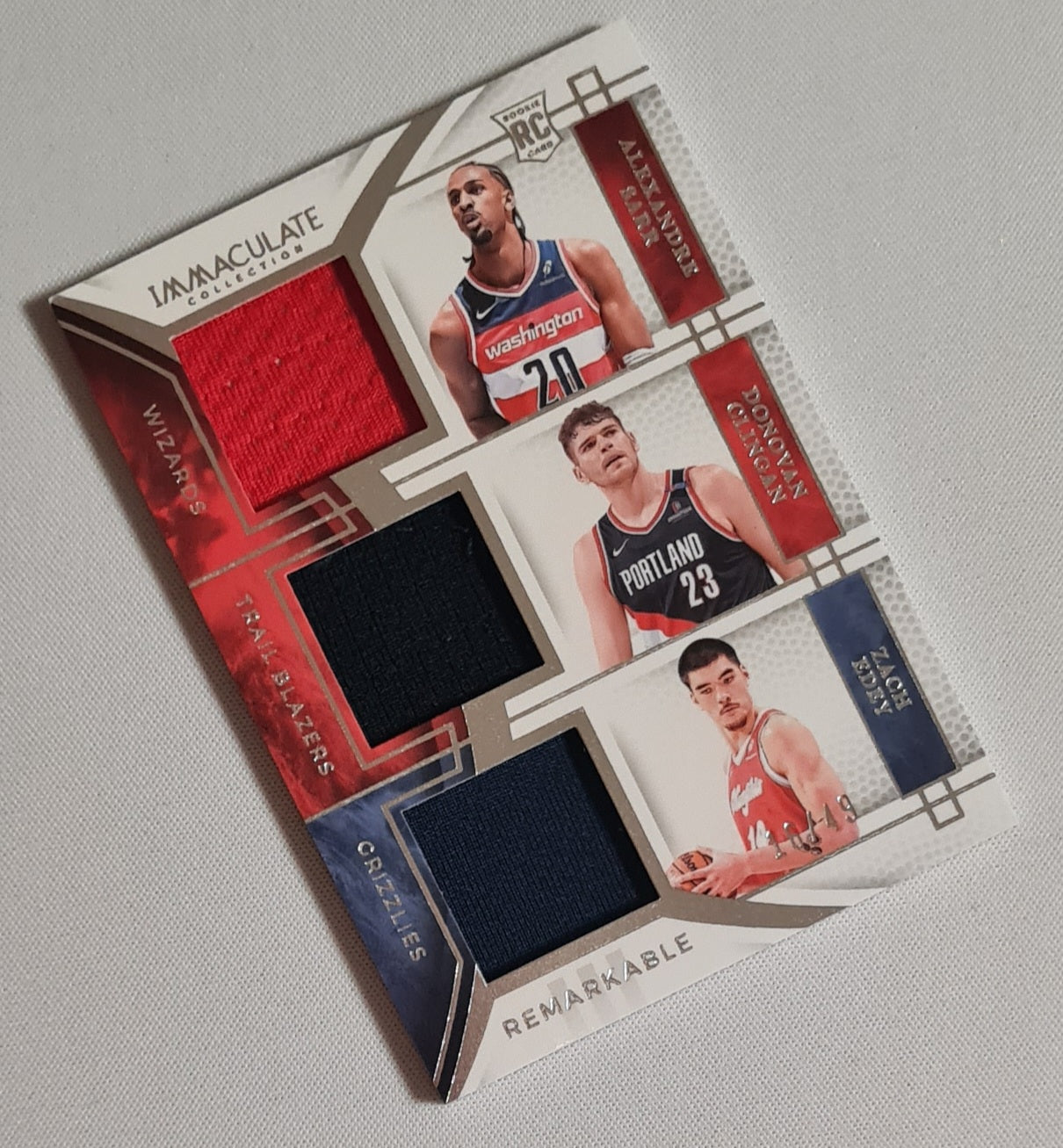 Sarr Clingan Edey - 2024/25 Panini Immaculate Remarkable Rookie Jerseys Triple #RJT-SCE