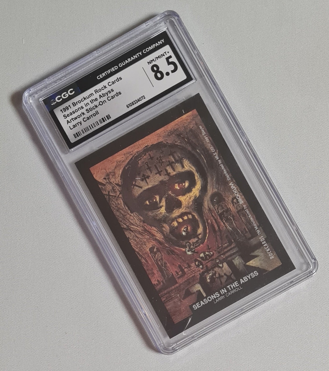 Larry Carroll - 1991 Brockum Rock Cards CGC 8.5 Seasons in the Abyss Artwork